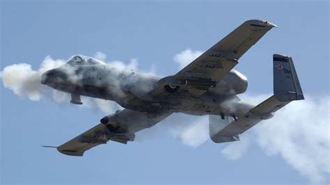 A-10 Thunderbolt II firing GAU-8 cannon during close air support mission