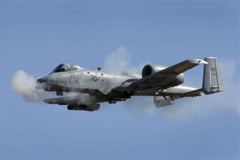 A-10 Thunderbolt II firing GAU-8 cannon during low altitude attack run