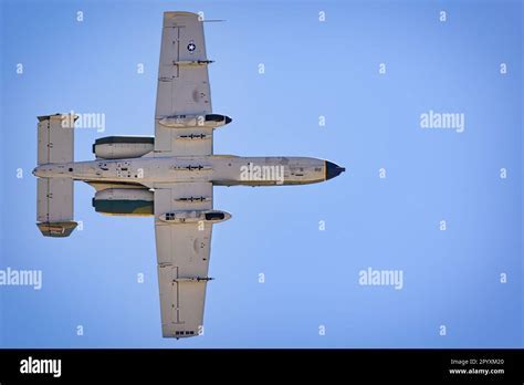 A-10 Warthog flying low over Afghan mountains during CAS mission