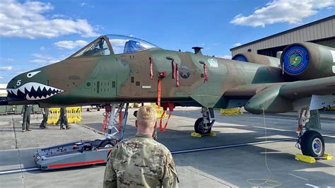 A-10 Warthog low altitude intimidation flight over naval swarm boats creating suppression effect