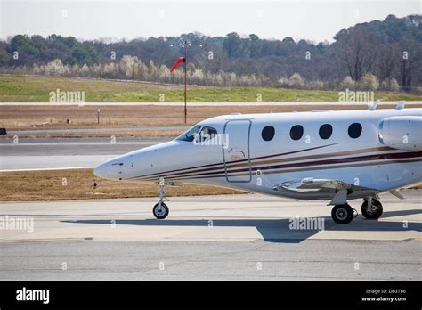 A private jet taxiing at the airport