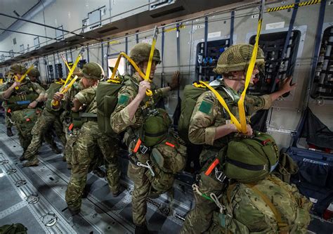 A400M Atlas paratroopers preparing for airborne deployment inside cargo cabin