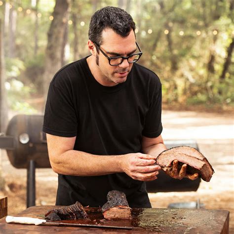 Aaron Franklin demonstrating brisket trimming techniques