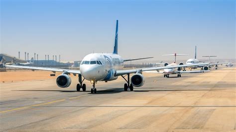 abandoned FlyEgypt check-in desk at Cairo International Airport following shutdown