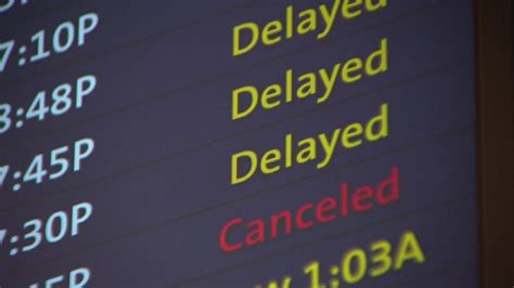 Abstract representation of flight information board showing delays and cancellations