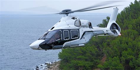 ach160 parked beside luxury yacht in monaco harbor