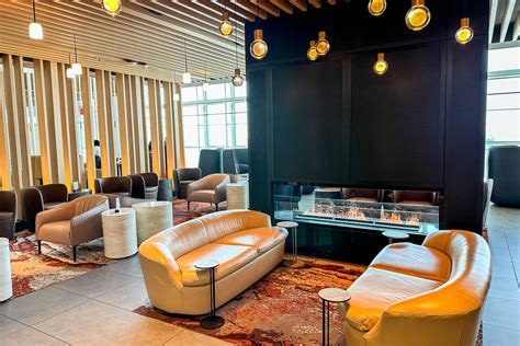 Admirals Club Newark with industrial design elements and cozy seating