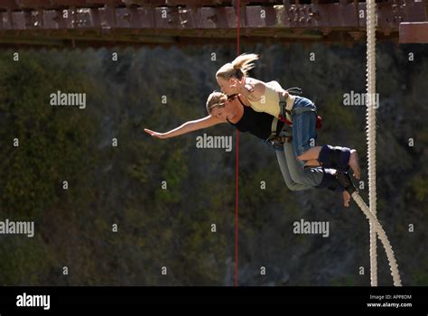 adventurer bungee jumping over Kawarau River in Queenstown