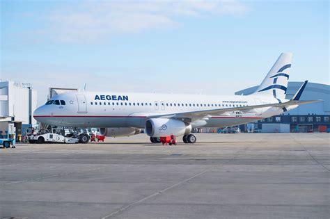 aegean airlines fleet on taxiway at athens airport