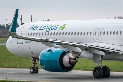 aer lingus airbus aircraft at gate with avios branding
