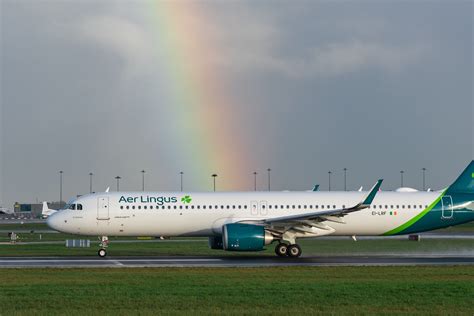 aer lingus aircraft at sunrise with mission patch graphic overlay