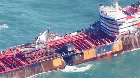 aerial drone shot of ship being towed to artificial reef site in Gulf of Mexico