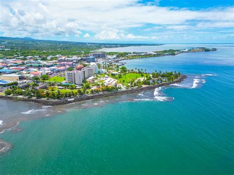 aerial view of apia samoa with qantas plane overhead