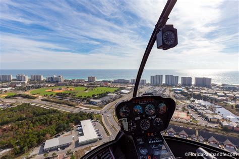 aerial view of Destin Harbor with Timberview helicopter in flight