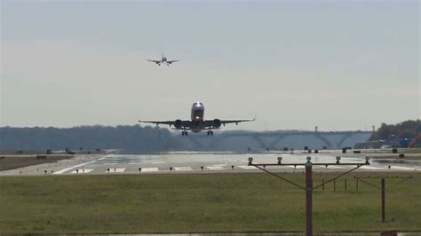 Aerial view of Reagan National Airport showing runway and terminal congestion