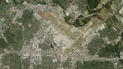 aerial view of San Antonio International Airport terminals and runways in Texas