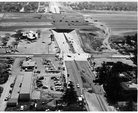 aerial view of Van Nuys Airport beneath Los Angeles Class B airspace with multiple private jets approaching