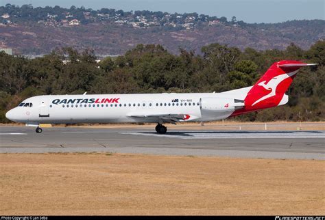 Aging QantasLink Fokker 100 aircraft awaiting retirement at Perth Airport
