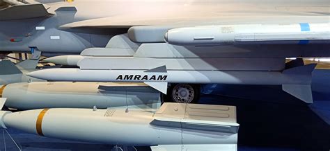 AIM-120 AMRAAM missiles mounted inside F-35A inboard stations, USAF test range, 2021