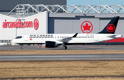 air canada airbus a220 at gate undergoing turnaround operations in montreal