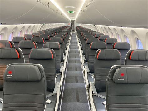 Air Canada Airbus A220 cabin interior showing passenger experience enhancements