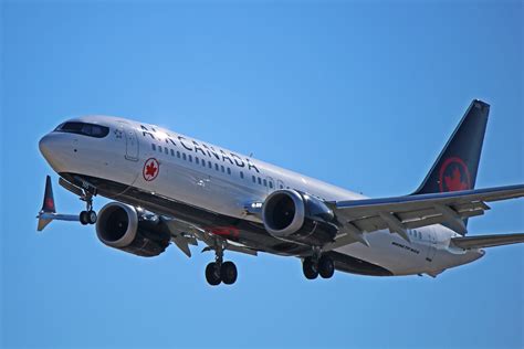 Air Canada Boeing 737 MAX 8 at Toronto Pearson International Airport with sunset background