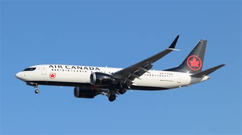 Air Canada Boeing 737 MAX 8 in flight over Canadian Rockies near Vancouver