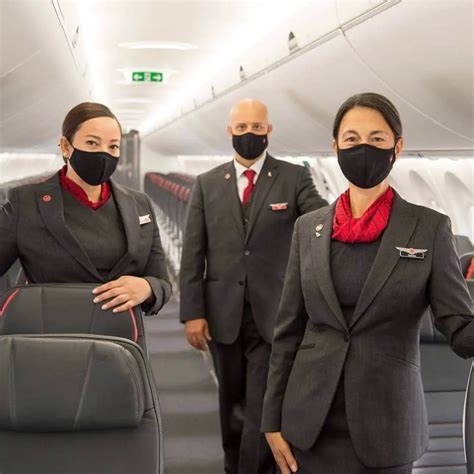air canada flight crew disembarking in belize city in tropical uniforms