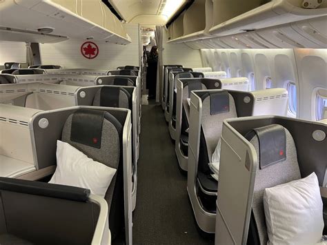 Air Canada international flight cabin with passengers en route to Europe