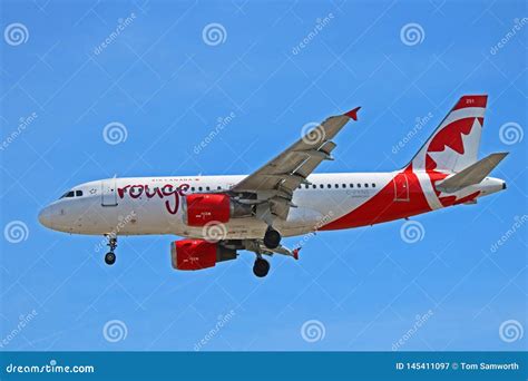 Air Canada Rouge Airbus A319-100 in flight