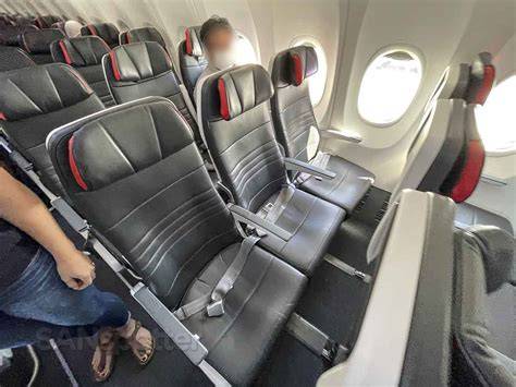 Air Canada Rouge passengers boarding a 737 MAX 8 for a Mexico sun destination flight with complimentary Bell Wi-Fi