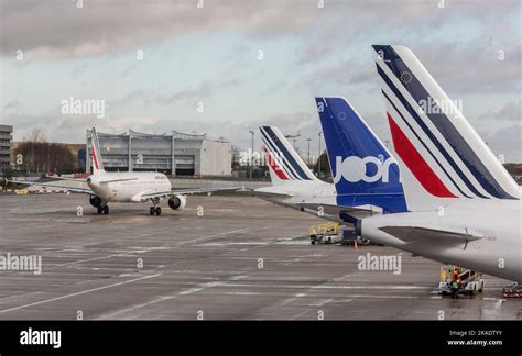 air france aircraft at charles de gaulle terminal preparing for departure