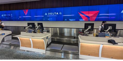 Air France, KLM, and Virgin Atlantic check-in counters at Heathrow Terminal 3