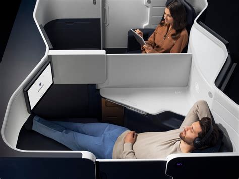 Air France new business class suite with sliding door and luxury bedding
