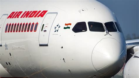 air india boeing 787 fleet maintenance crew inspecting fuel switch panels
