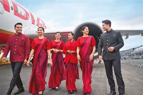 air india cabin crew boarding southeast asia-bound boeing 787 in delhi