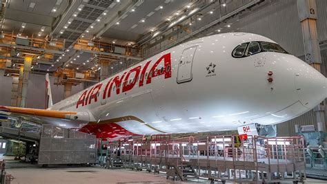 air india safety chief speaking to maintenance crew at night hangar