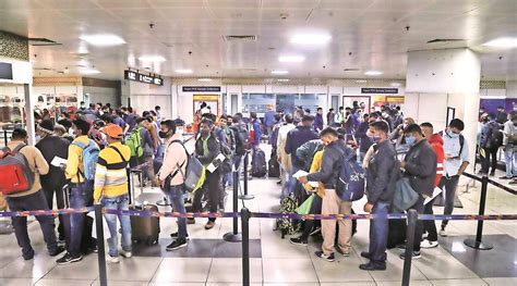 air india service desk at delhi airport crowded with stranded passengers