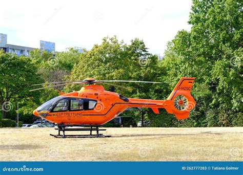 air methods eurocopter ec135 on rooftop hospital helipad at sunset