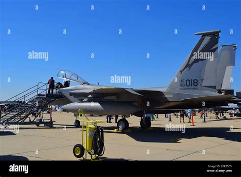 Air National Guard F-15C Eagle on alert ramp with pilots preparing for scramble