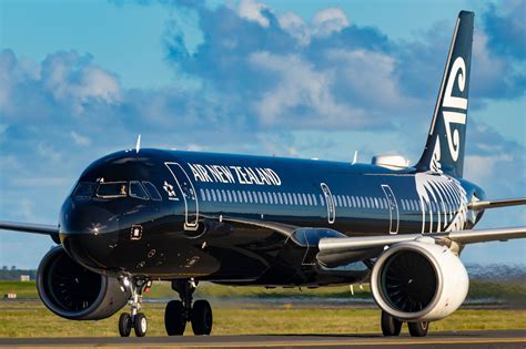 air new zealand jet service aircraft taxiing at hamilton airport