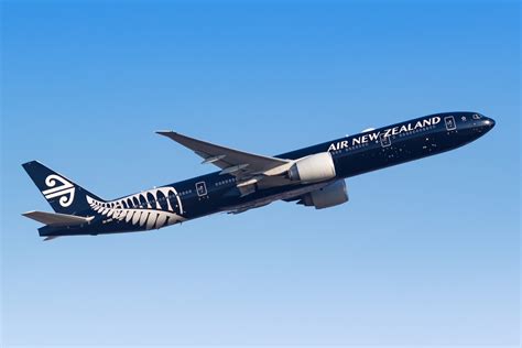 air new zealand jet taking off under sunrise sky symbolizing ambition