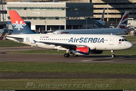 Air Serbia Airbus A319 on approach over Lake Geneva