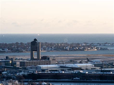 Air traffic control tower overlooking Boston Logan International Airport runways