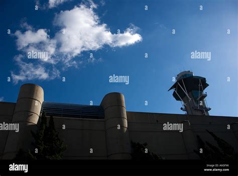 air traffic control tower overlooking delta planes during busy afternoon operations