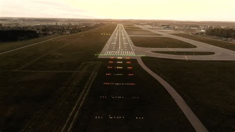 air traffic control tower runway operations aircraft taxiing evening congestion airport lighting