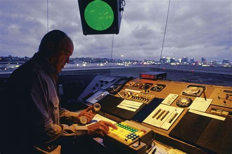 air traffic controller coordinating takeoffs at busy international airport