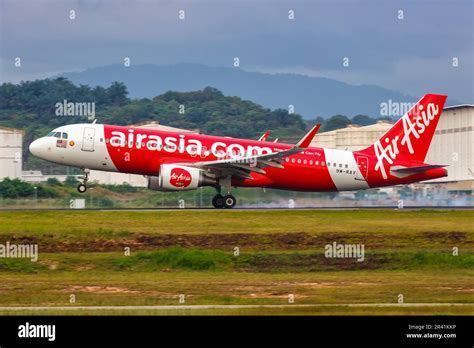 AirAsia A320neo with new livery landing at KLIA2 in 2024