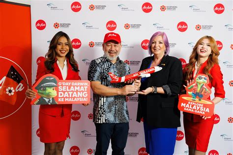 AirAsia executives and Northern Territory officials celebrating new Darwin-Kuala Lumpur route launch