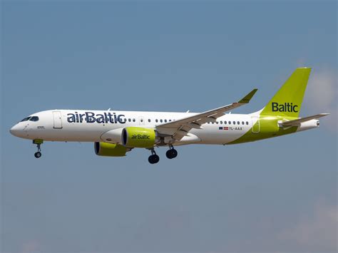 airBaltic Airbus A220 preparing for a symbolic flight to Kyiv from Riga